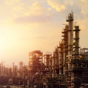 industrial-furnace-cracked-hydrocarbon-petrochemical-business-sunset-sky-background-manufacturing-petroleum-industrial-plant